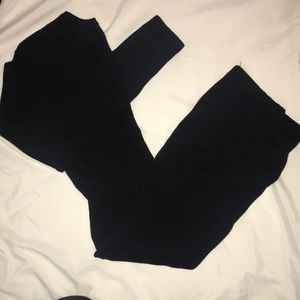 All black knee length body con dress